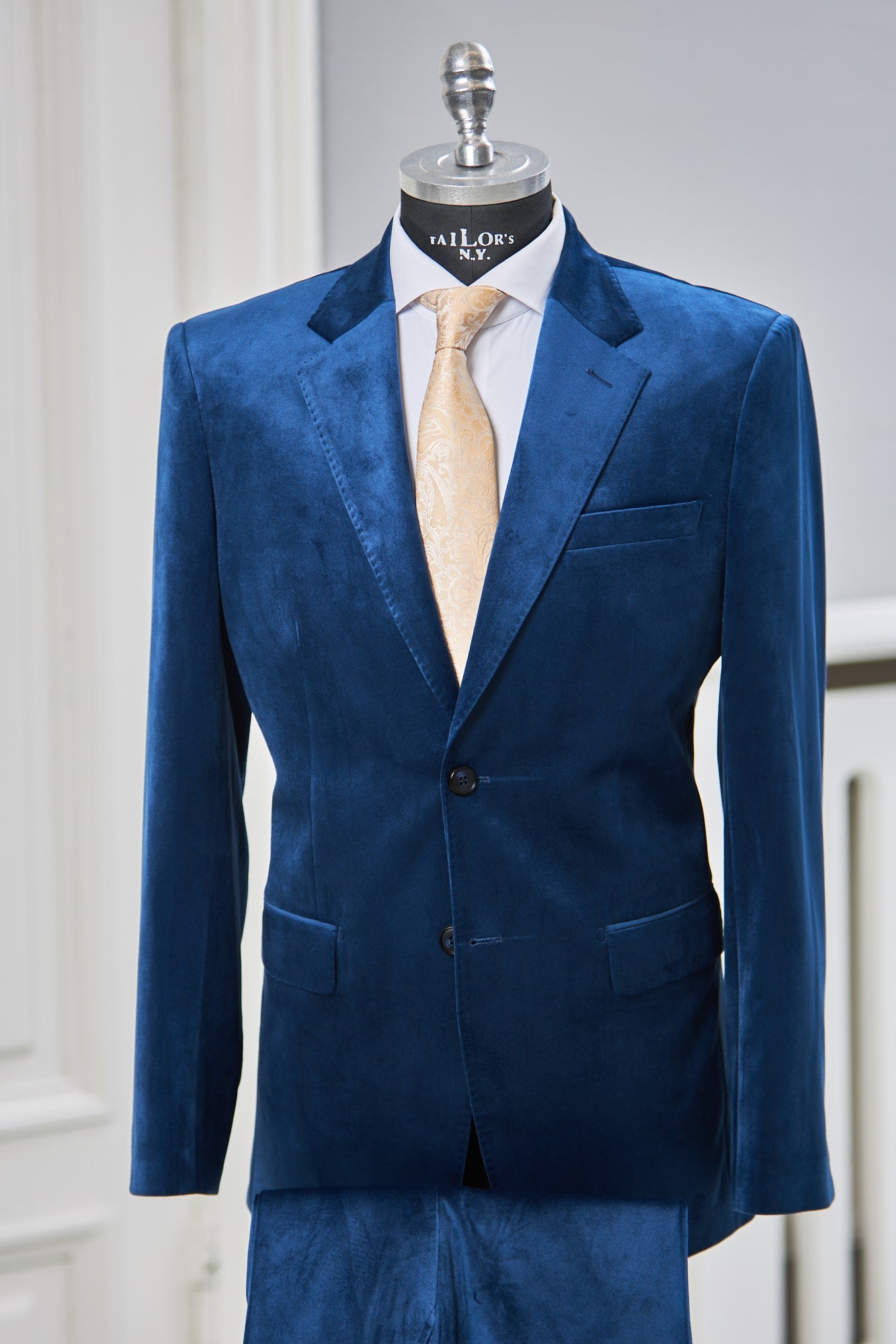 blå velour jakkesæt