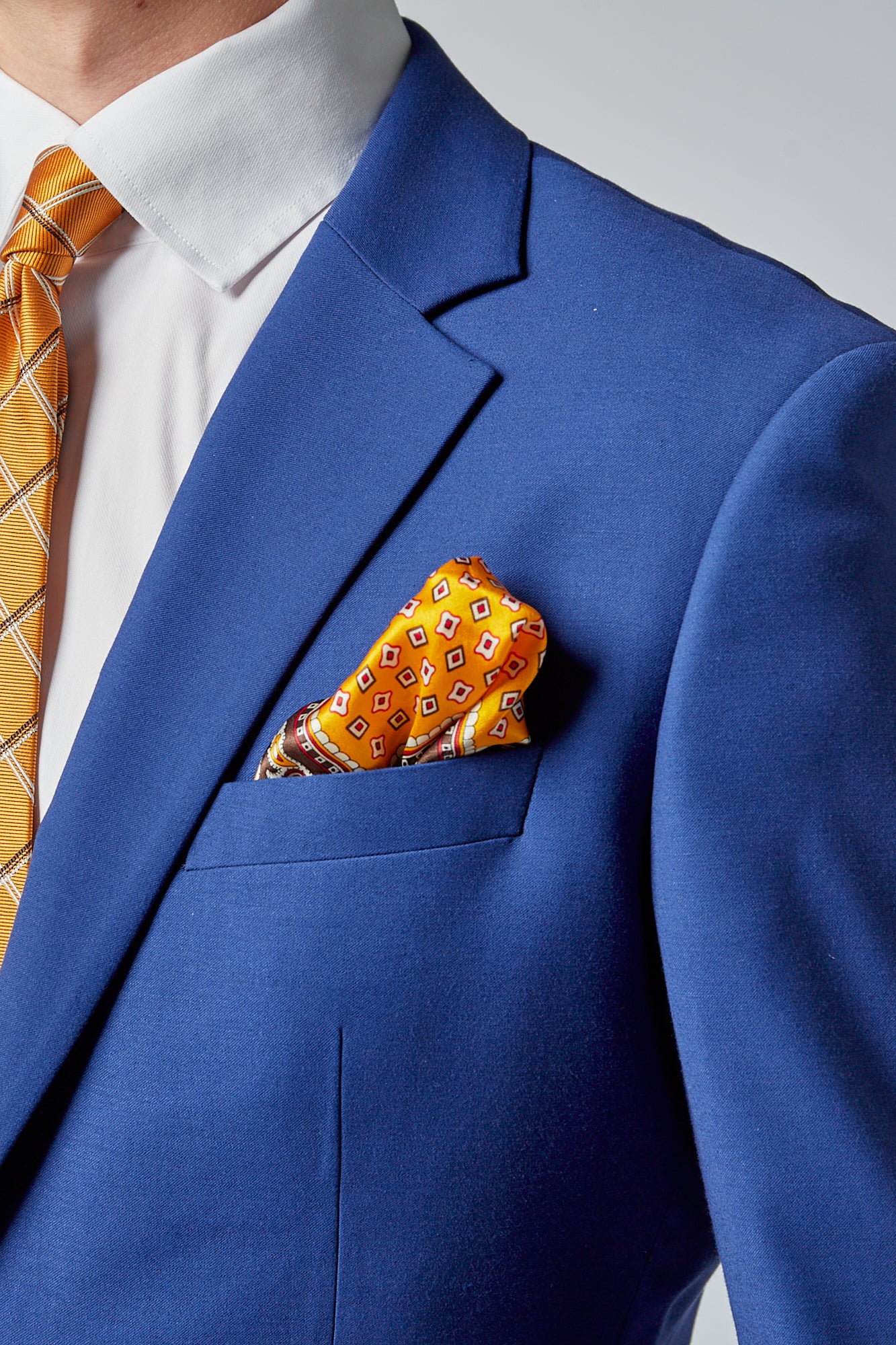 guld lommeklud til blazer