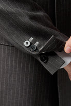 funktionelle knapper på skræddersyet blazer jakke